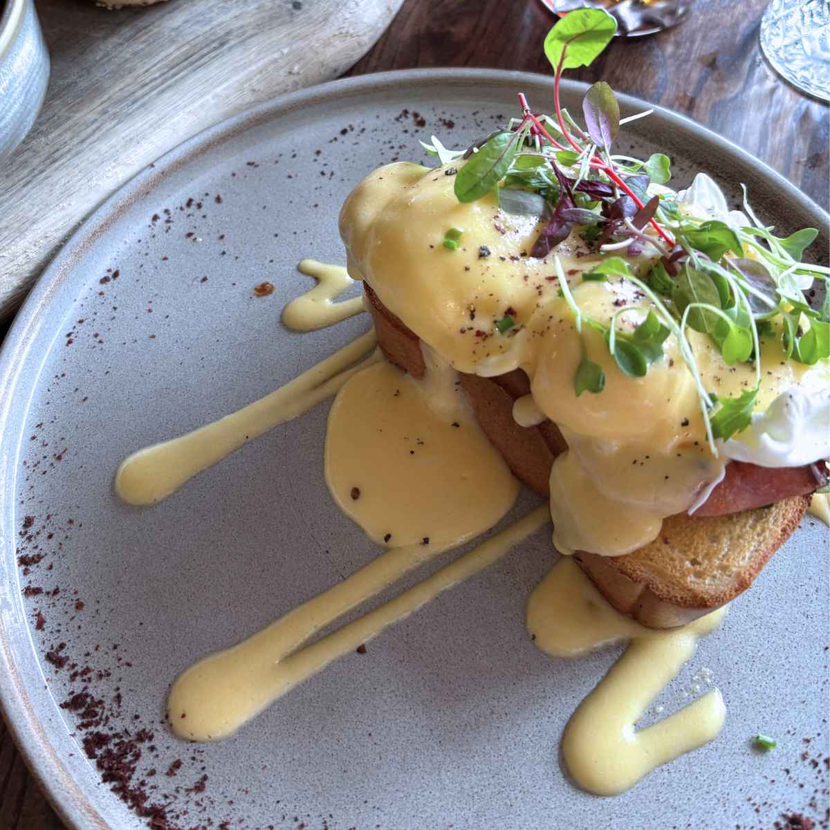 Plate of Eggs Benedict for gluten-free breakfast ideas.