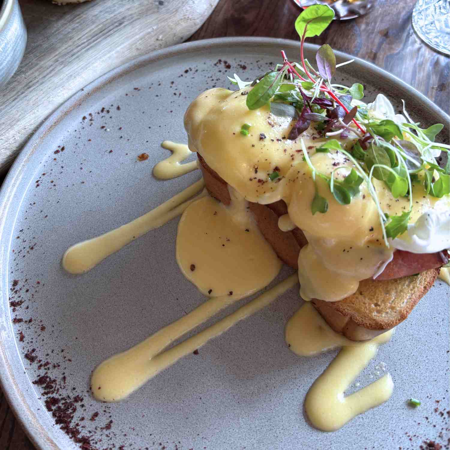 Plate of eggs benedict for a gluten-free breakfast idea.
