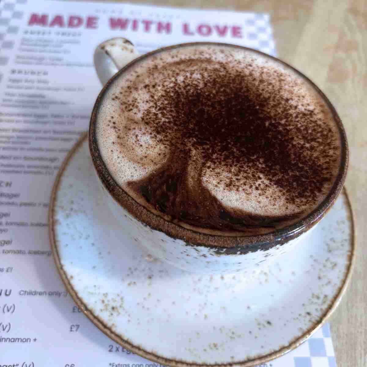 Coffee made with gluten-free oat milk